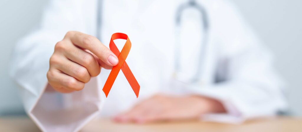 Fita laranja, símbolo do Fevereiro Laranja de prevenção à leucemia